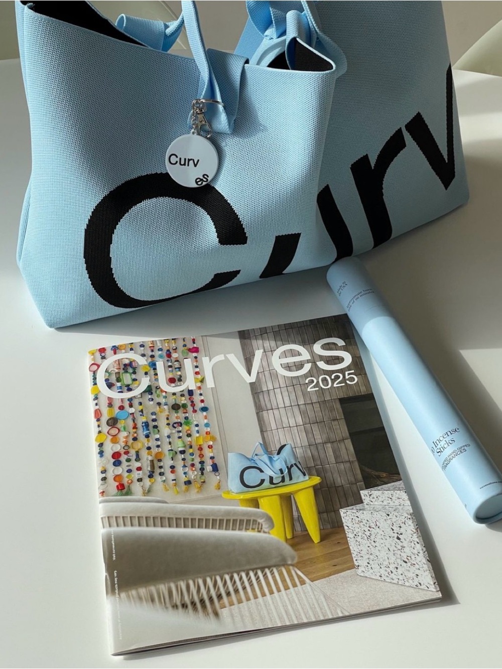 Curves Light Blue Tote Bag with black logo